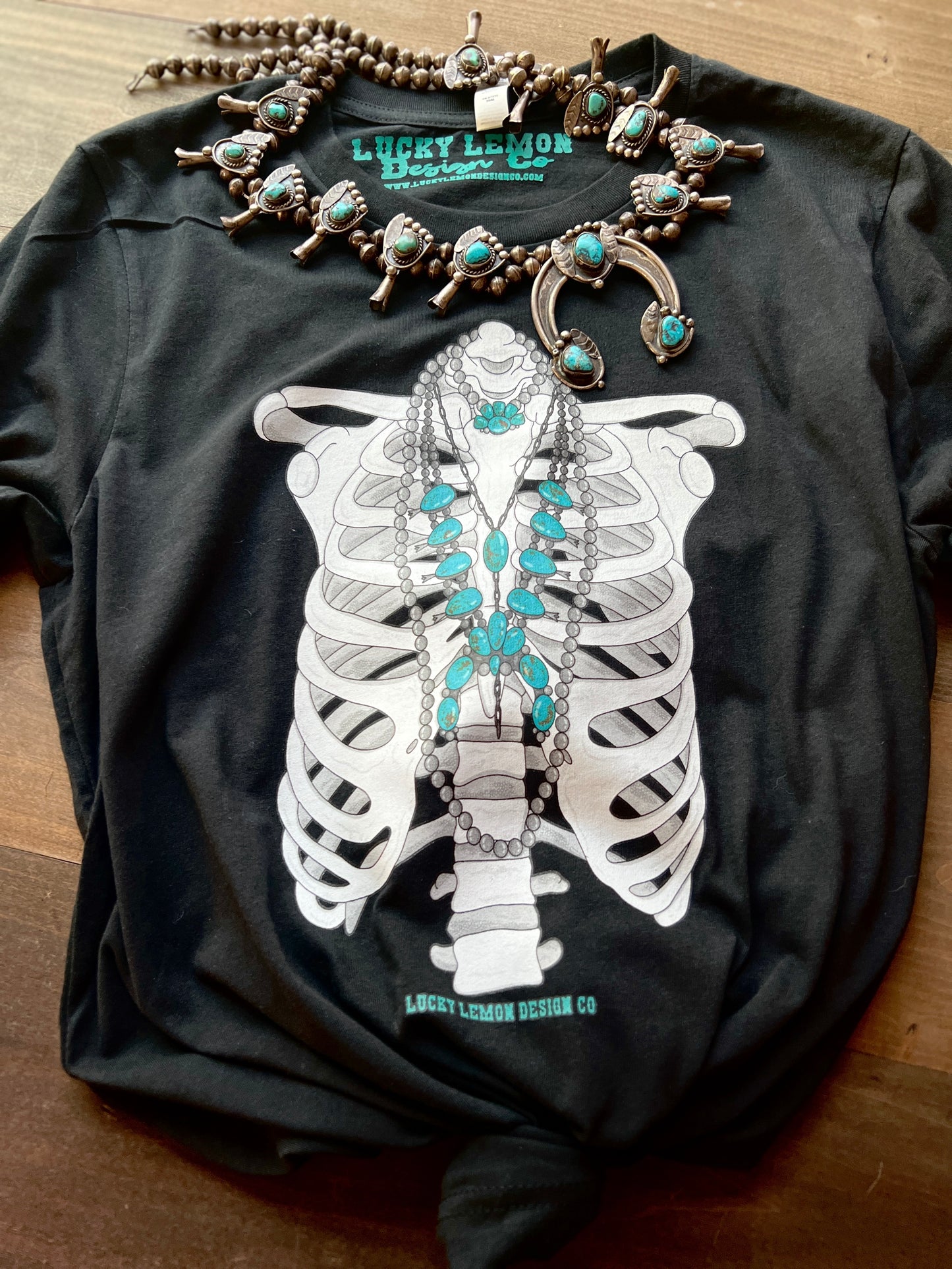 Turquoise Drippin Skelly Tshirt